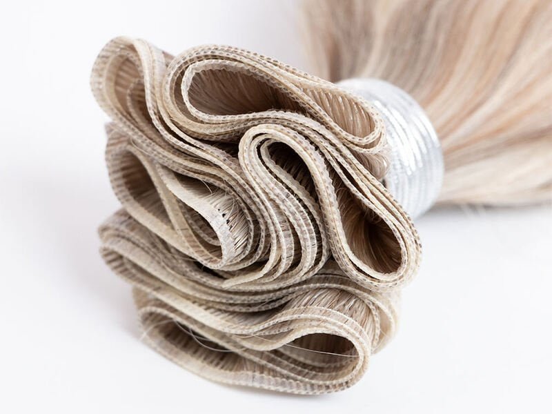 Reinforced weft construction
